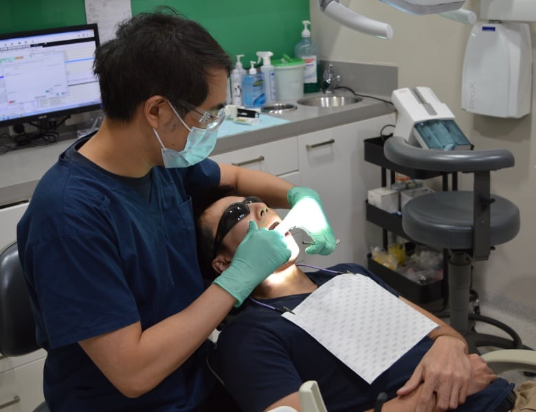 undergoing a general dentistry treatment at herald avenue dental centre